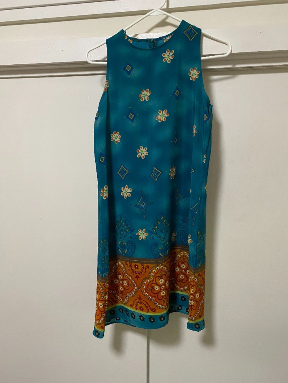 Deep turquoise, sleeveless dress, w/floral & other designs, size M